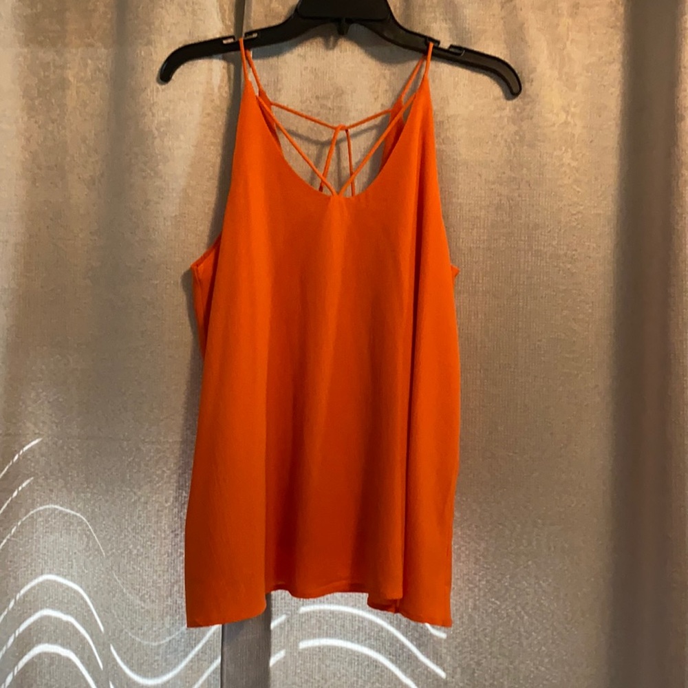 Tank with fun back. Worn once